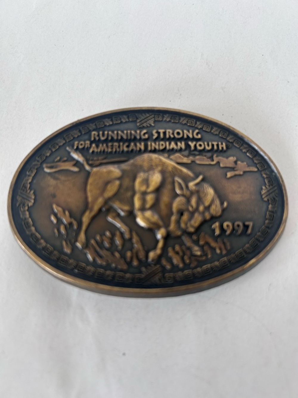 Vintage Running Strong for American Indian Youth belt buckle